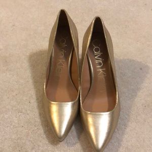 Golden heels. Perfect for a formal event.